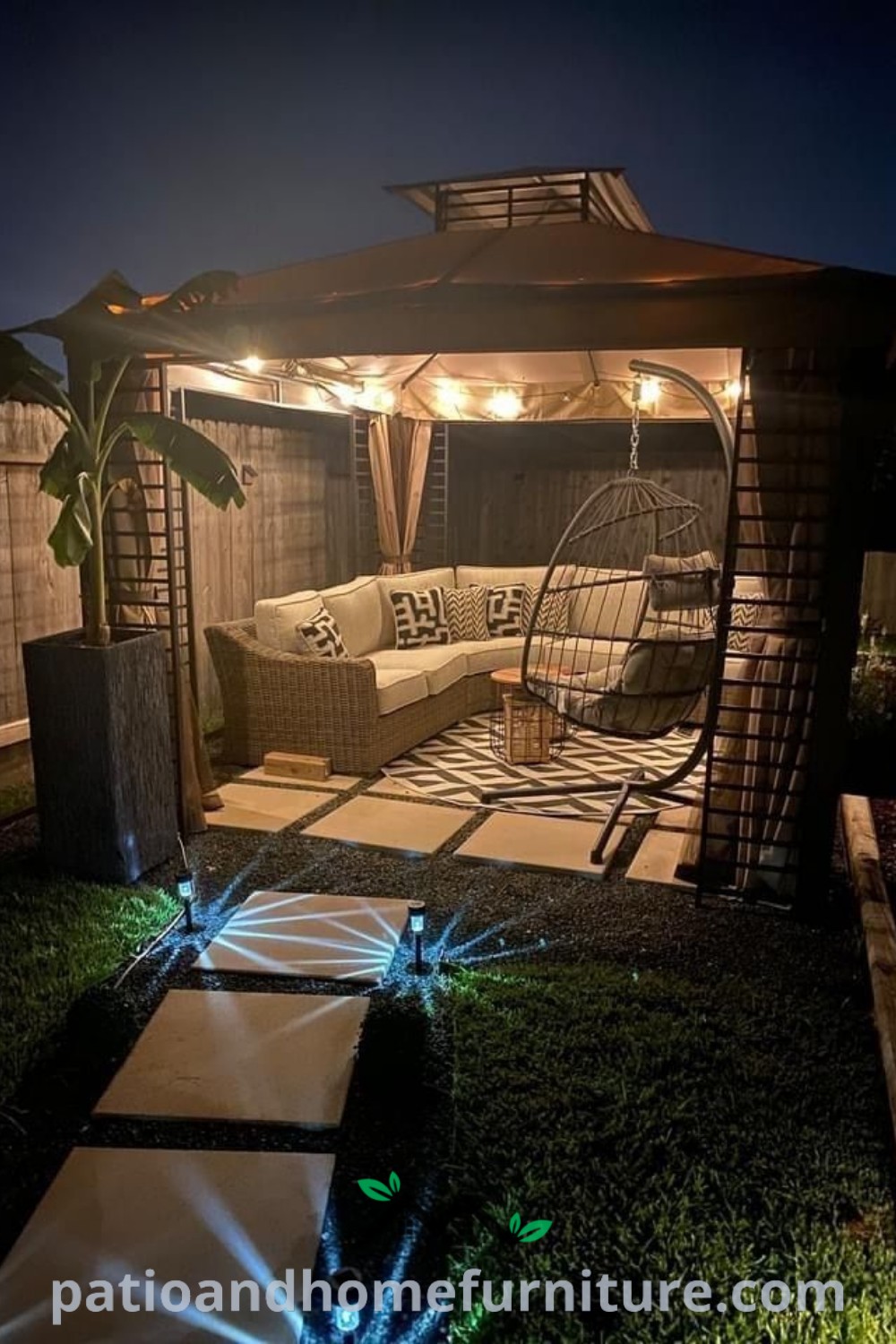 Cozy outdoor living area featuring a lit gazebo adorned with string lights, comfortable seating, and potted plants, creating a warm and inviting space perfect for gatherings, showcased on wellnesswink.com.