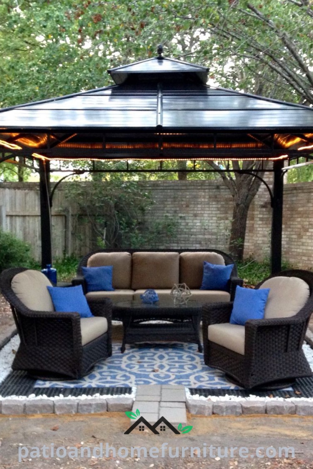 Cozy gazebo with couches and tables under it, surrounded by gravel flooring, providing a perfect gathering spot for outdoor relaxation, ideal for anyone looking for cozy ideas and unique decor inspirations for their home at wellnesswink.com.