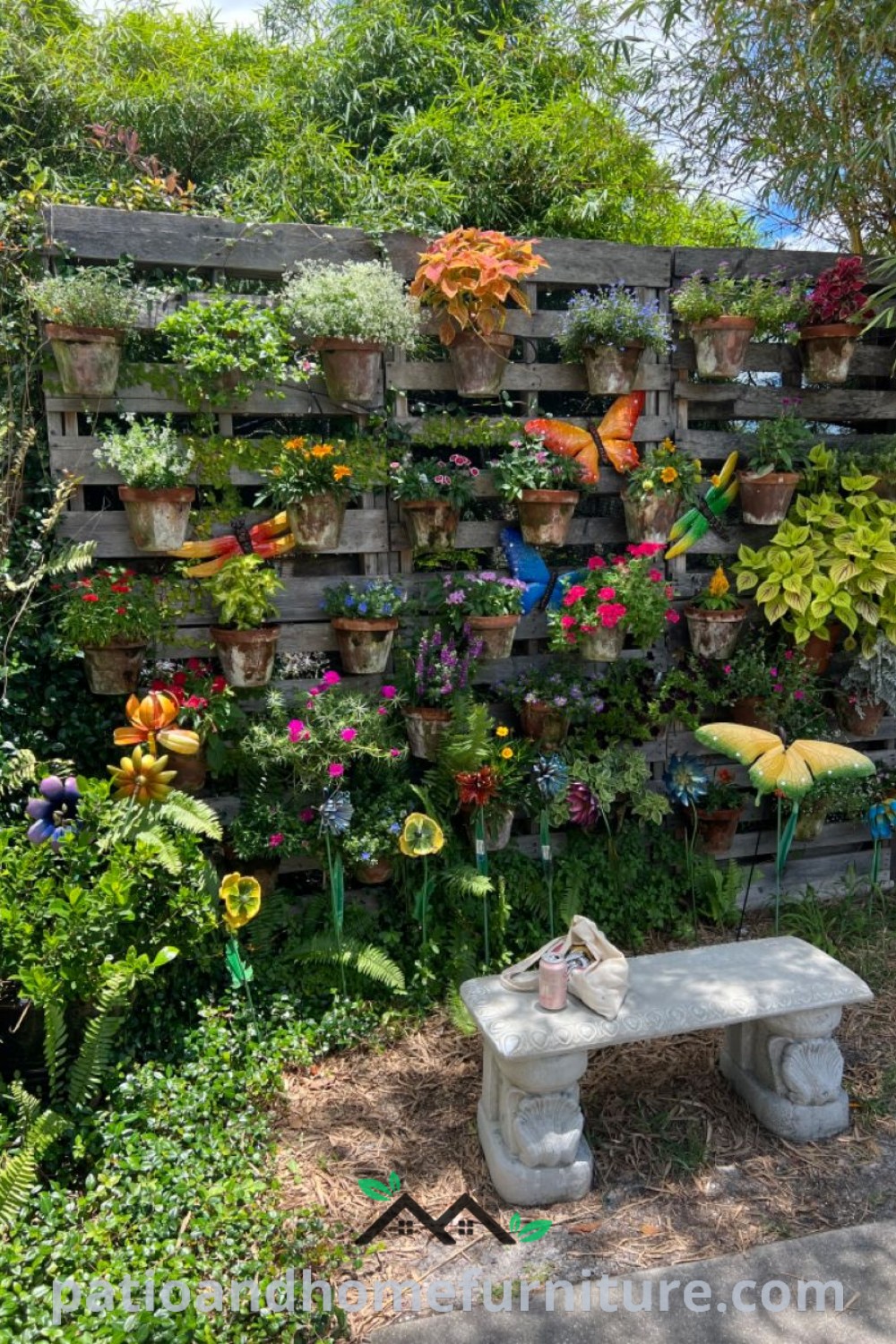 Cozy outdoor sitting area with butterfly statues and potted plants as a backdrop, featuring inviting seating arrangements and decorative elements that inspire peaceful moments in your garden. Visit wellnesswink.com for more cozy home design ideas and decor inspirations.