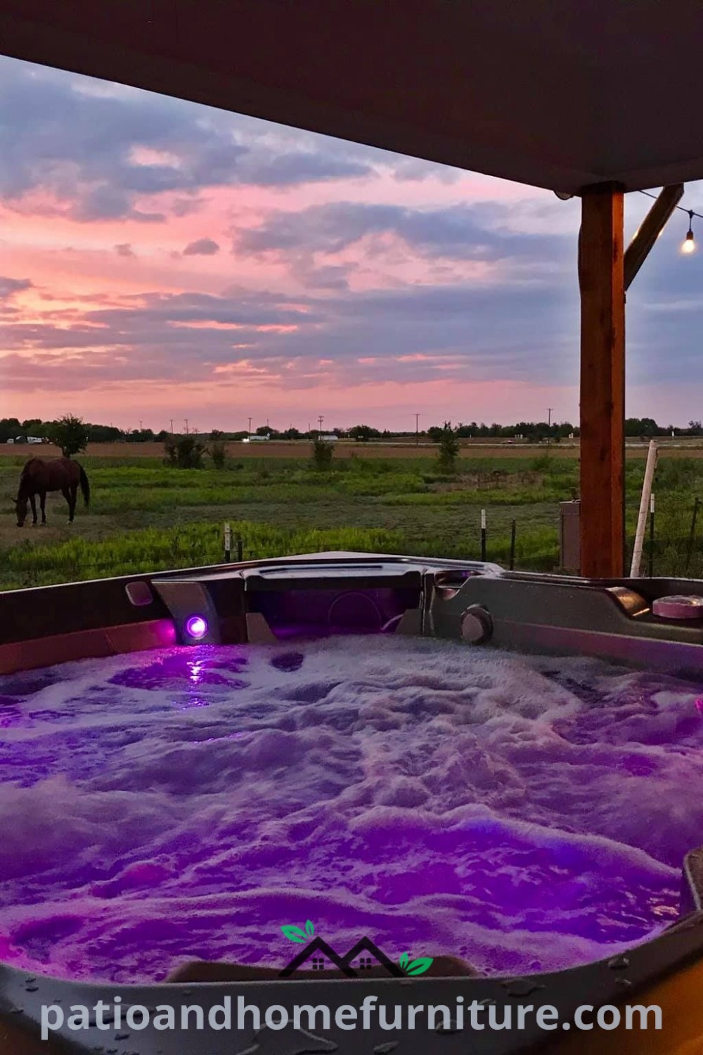 Outdoor hot tub with purple water and ambient lights at sunset, surrounded by relaxing landscaping, offering cozy and inspiring decor ideas for your home and wellnesswink.com.
