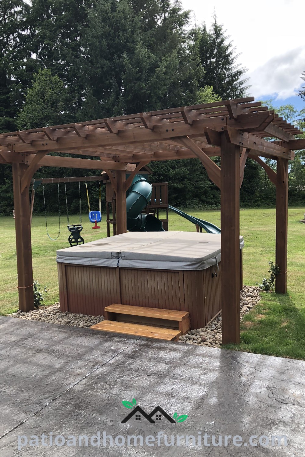 Hot tub under a wooden pergola surrounded by plants and lights, offering cozy ideas for an inspiring outdoor space, perfect for relaxation and gatherings, featured on wellnesswink.com.