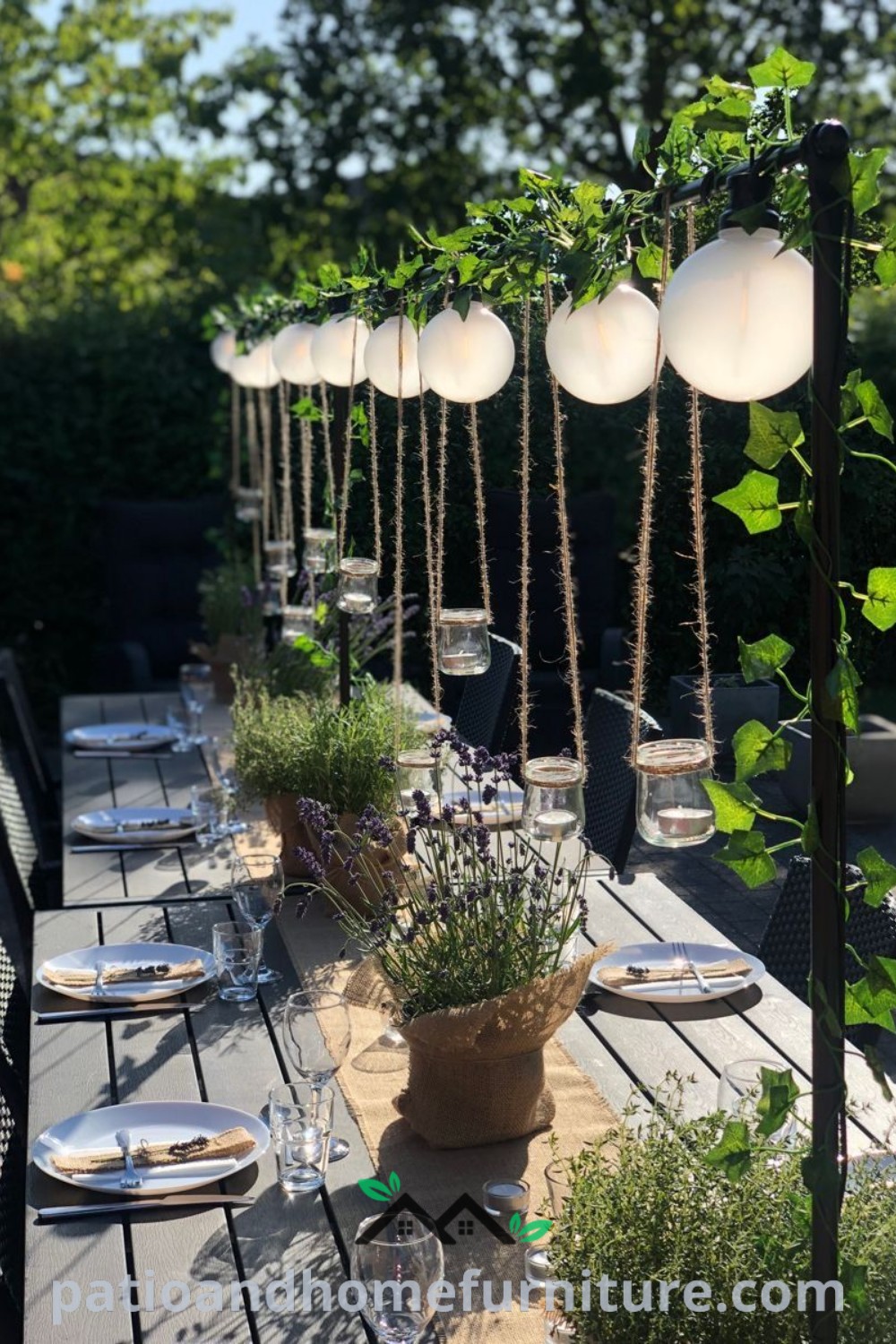 A beautifully styled outdoor dining table set with elegant place settings and hanging planters above, creating a cozy and inviting atmosphere for gatherings, providing inspiring decor ideas for your home at wellnesswink.com.