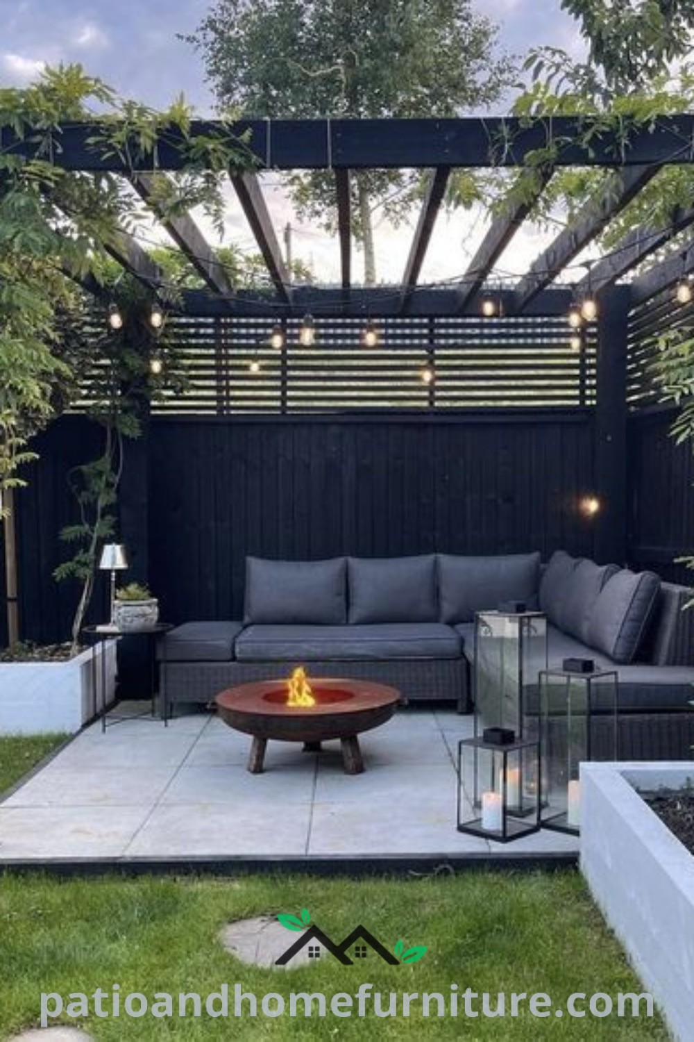 Outdoor living area with couches, tables, and lights, showcasing cozy design ideas and decor inspirations for creating an inviting backyard space. Visit wellnesswink.com for unique ideas and inspiration for your home.