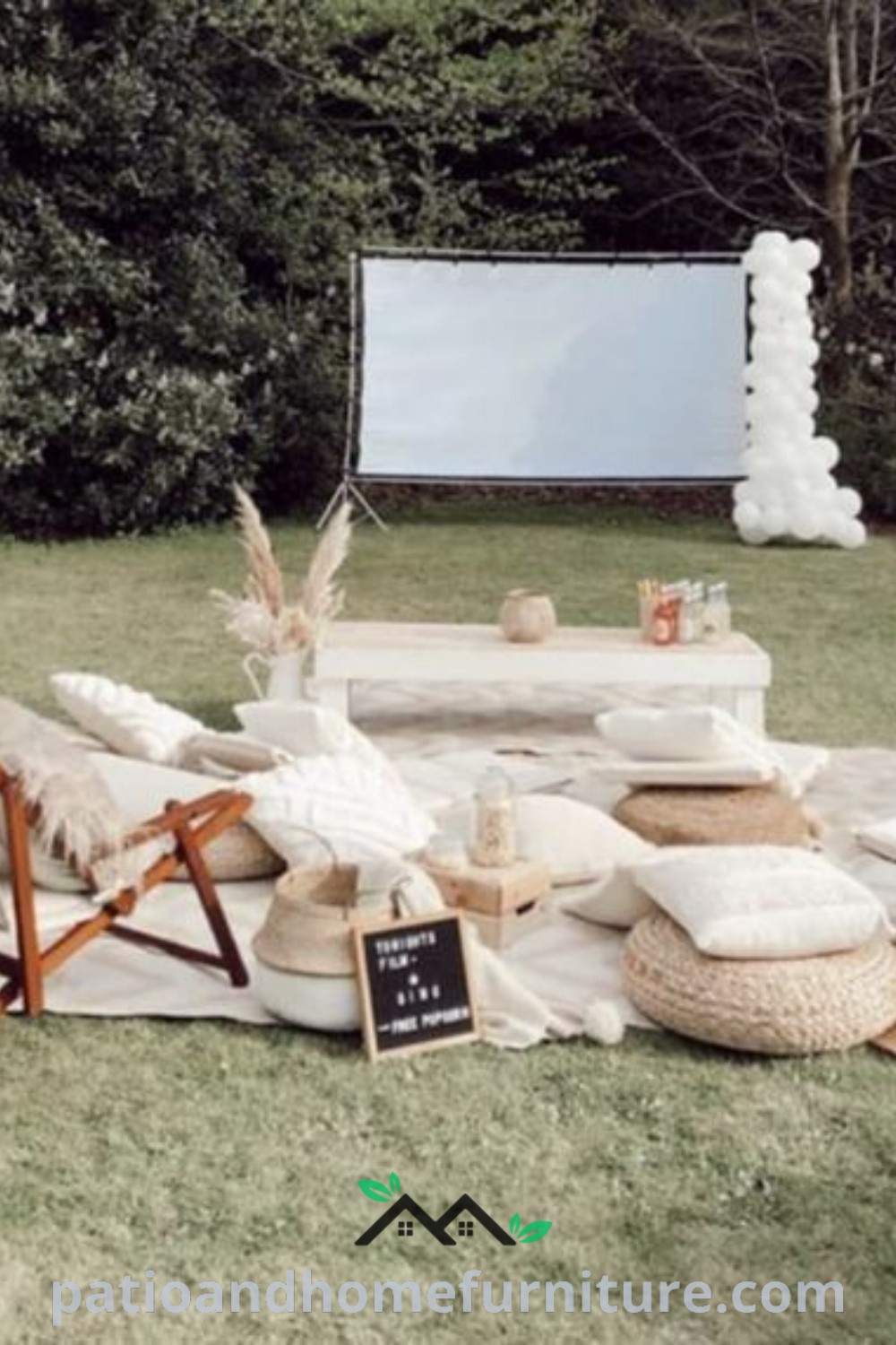 Cozy outdoor movie setup with chairs and pillows on grass, large screen for films, surrounded by inviting decor ideas for a fun evening with friends, perfect for backyard enjoyment, as seen on wellnesswink.com.