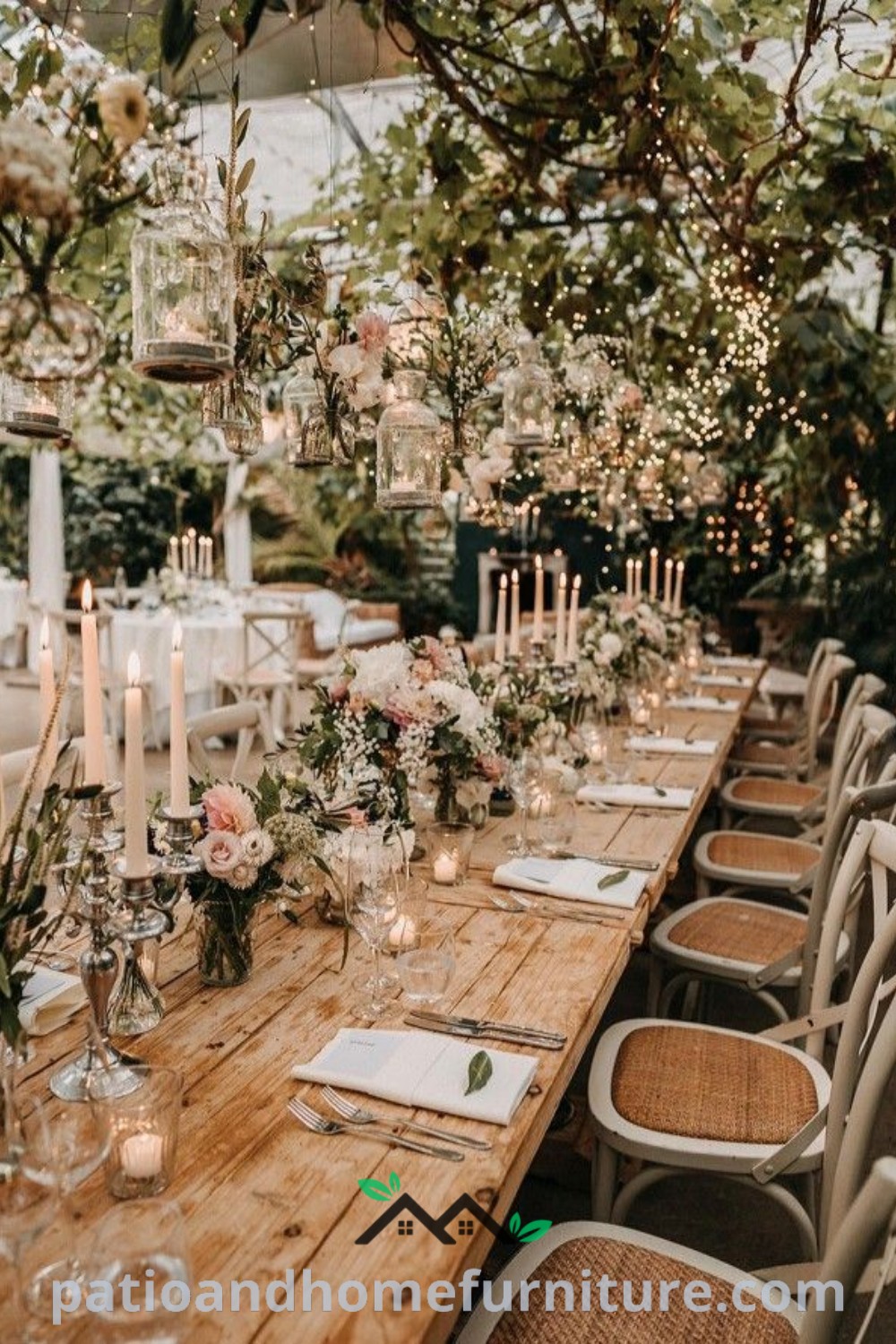 A beautifully arranged wedding table featuring a long wooden surface adorned with white and pink flowers and tall flickering candles, creating a cozy and inviting atmosphere for a dream wedding. Visit wellnesswink.com for cozy ideas and inspiring decor inspirations.