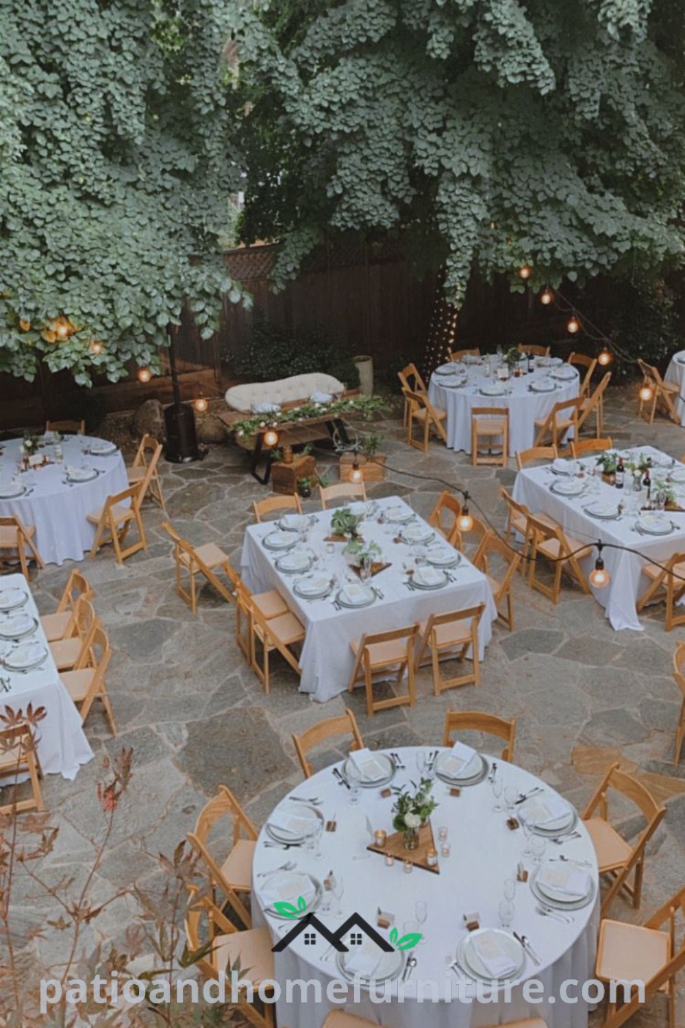Elegant outdoor dining area with round and square tables set for a formal dinner, beautifully decorated with floral centerpieces, surrounded by greenery, creating a cozy and inviting atmosphere for events like weddings and dinner parties, seen at wellnesswink.com.