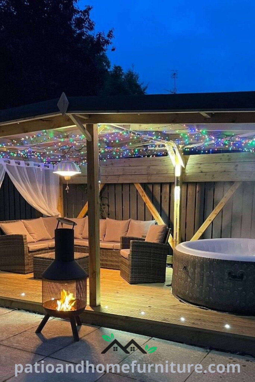 Cozy outdoor hot tub surrounded by fairy lights and curtains, creating an inviting and tranquil spa-like atmosphere, perfect for relaxing evenings; wellnesswink.com.