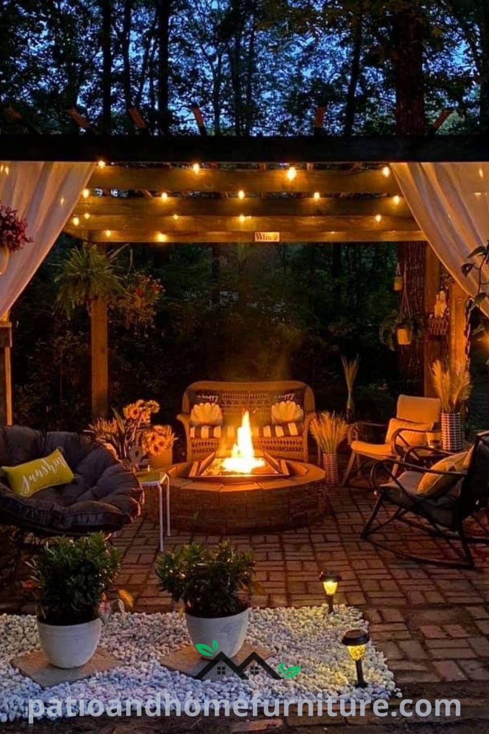 Cozy outdoor fire pit surrounded by potted plants and illuminated with string lights, creating a warm and inviting atmosphere for backyard entertaining, featured on wellnesswink.com.