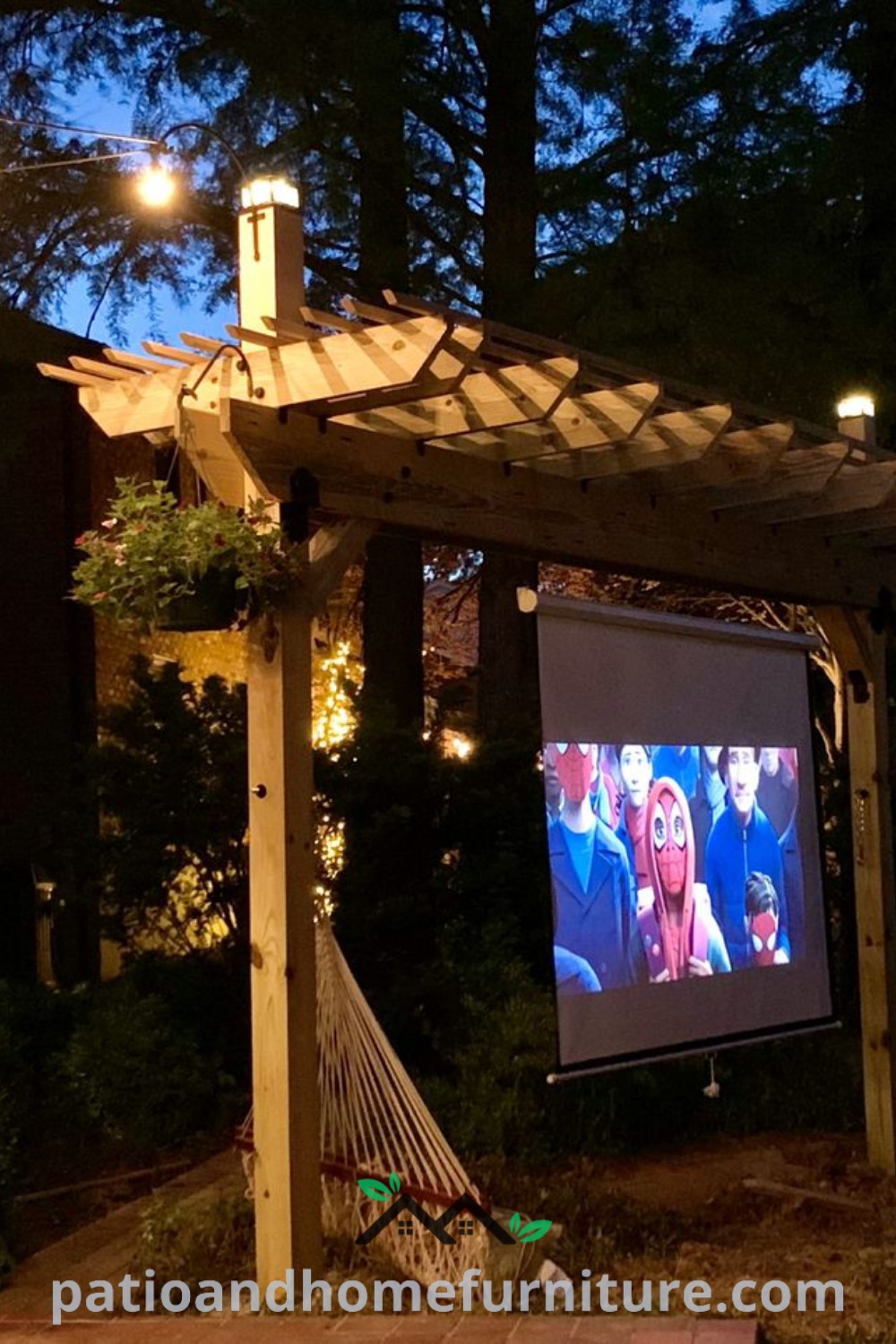 Outdoor movie setup in a cozy backyard with a DIY screen under a pergola and vibrant flower beds, offering design ideas and inspirations for creating unique home entertainment spaces at wellnesswink.com.