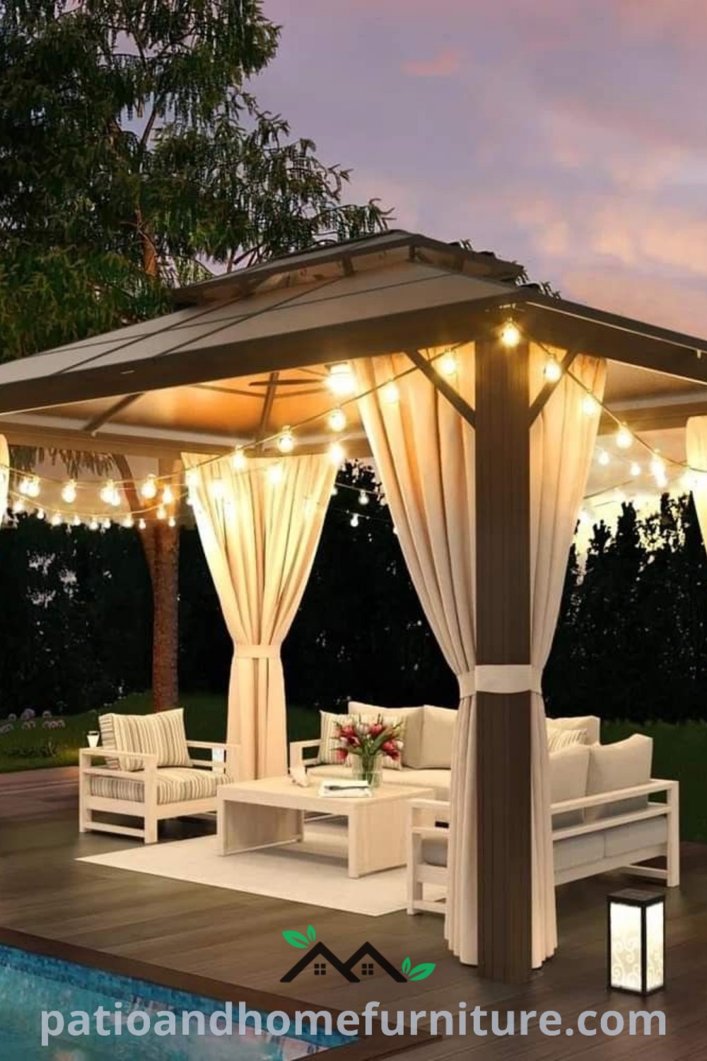 A cozy gazebo with curtains and lights beside a swimming pool at dusk, creating a warm and inviting atmosphere, showcasing unique ideas for outdoor decor. Visit wellnesswink.com for more inspiring decor ideas.