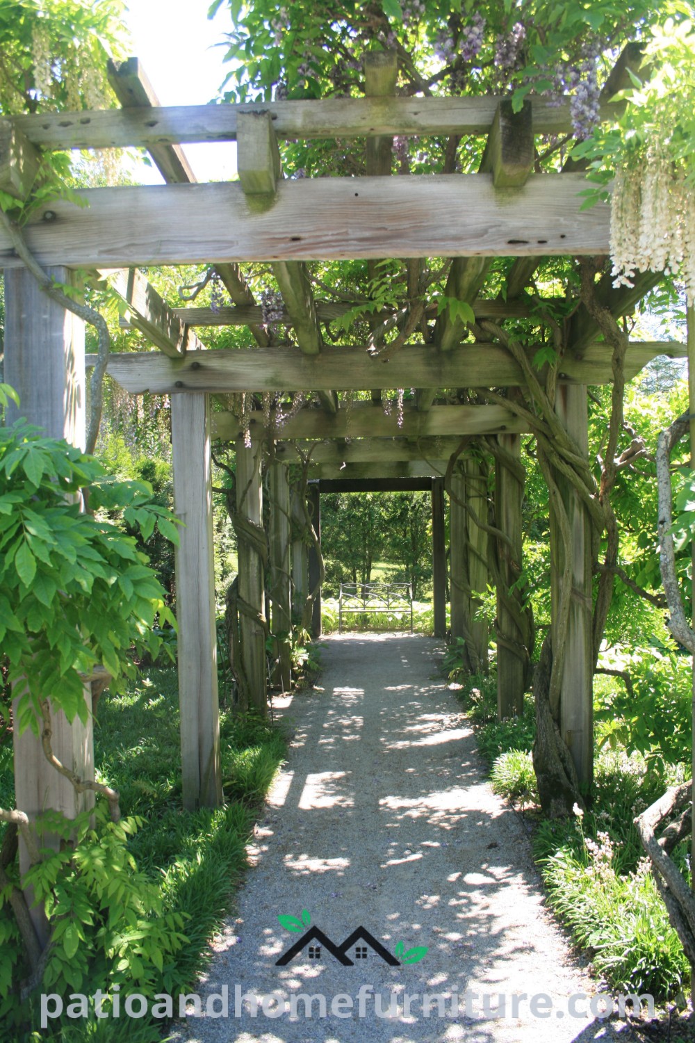 A picturesque garden pathway surrounded by lush trees and inviting arbors, featuring cozy ideas and unique design inspirations for your home, perfect for creating a tranquil outdoor setting, wellnesswink.com.