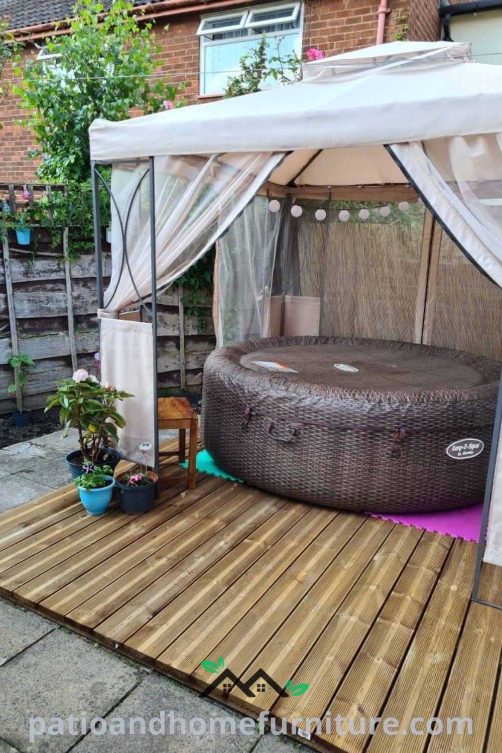 Cozy outdoor hot tub on a wooden deck surrounded by greenery and warm lighting, offering inviting design ideas for relaxation and leisure at home, featured on wellnesswink.com.