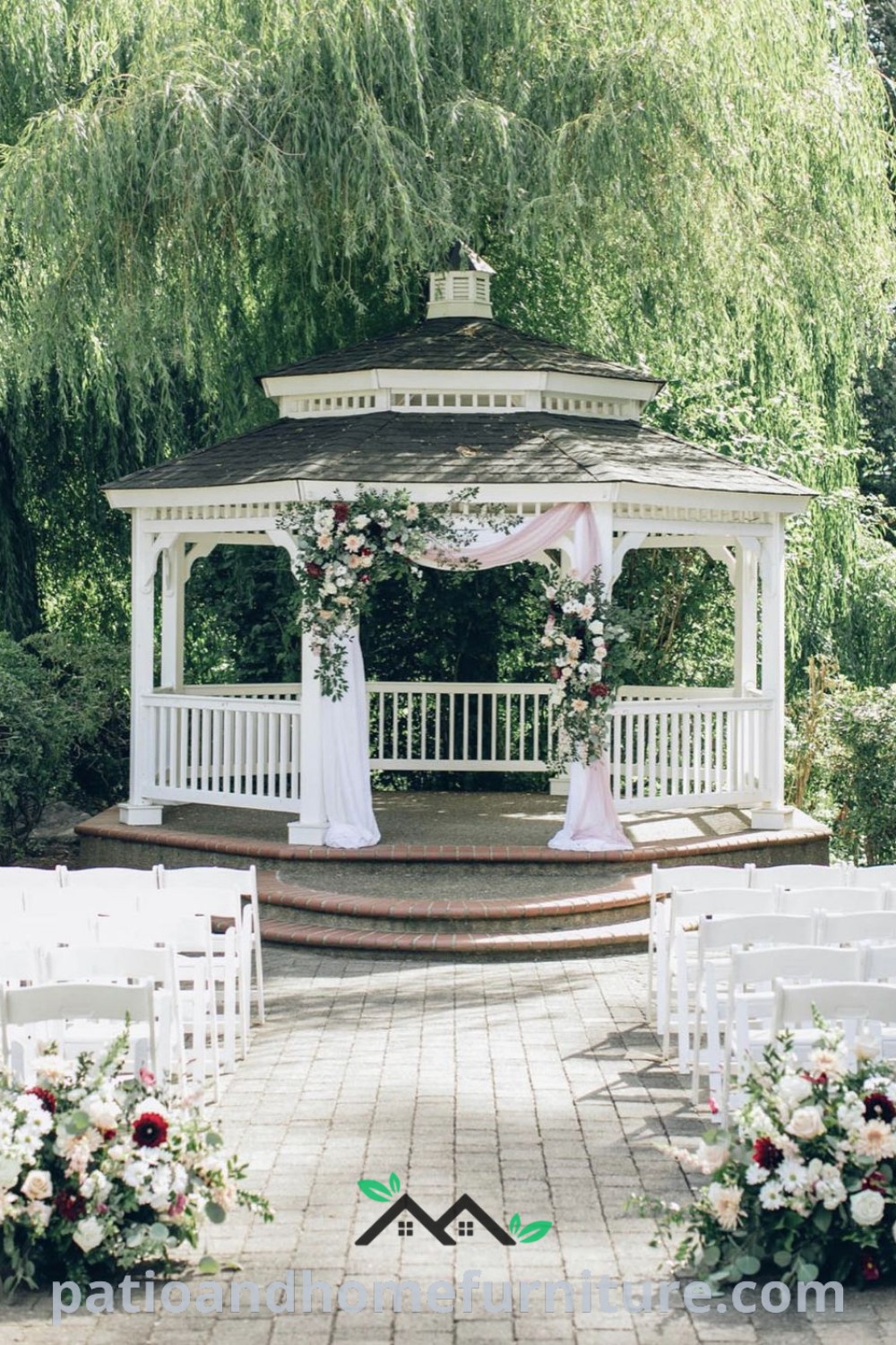 A decorated gazebo surrounded by white chairs and vibrant flowers, creating a picturesque wedding ceremony space, showcasing cozy design ideas and decor inspirations for outdoor celebrations at wellnesswink.com.