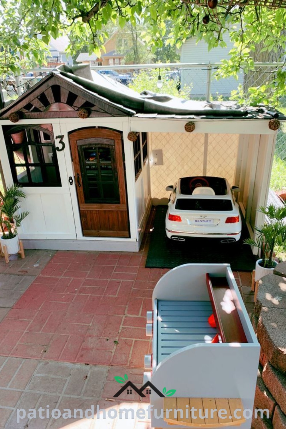 A cozy backyard play area with a small house and a parked car, featuring a vibrant playhouse and swings, providing inspiring design ideas for outdoor kids