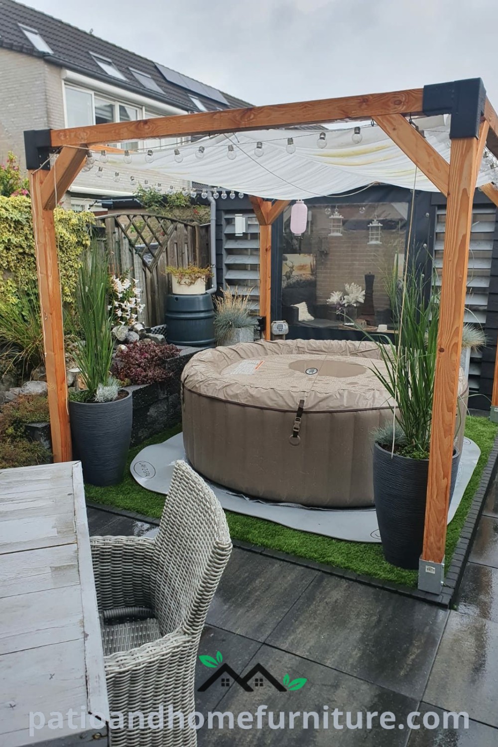Cozy hot tub shed with outdoor jacuzzi under a pergola, featuring inviting decor ideas and inspirations for creating a unique and relaxing backyard space, from website wellnesswink.com.