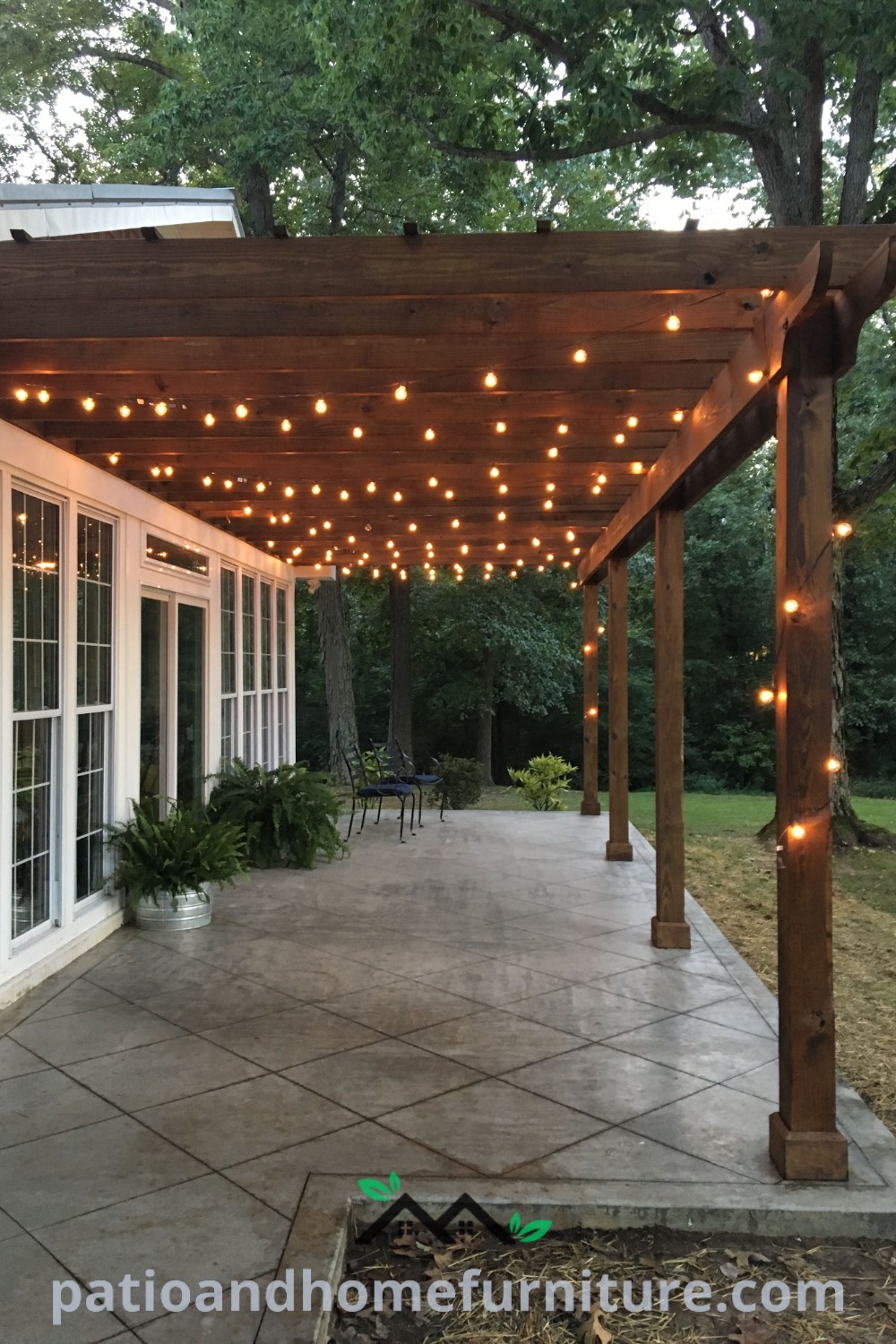 Outdoor covered patio with string lights and a pergola creating a cozy atmosphere, ideal for gatherings, featuring comfortable furniture and playful decor ideas at wellnesswink.com.