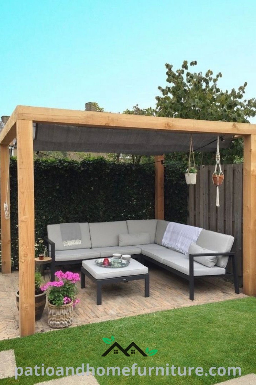 Outdoor living area featuring comfortable couches, stylish tables, and vibrant potted plants on the grass, perfect for relaxation and gatherings with DIY gazebo and pergola design ideas, offering cozy home inspirations at wellnesswink.com.