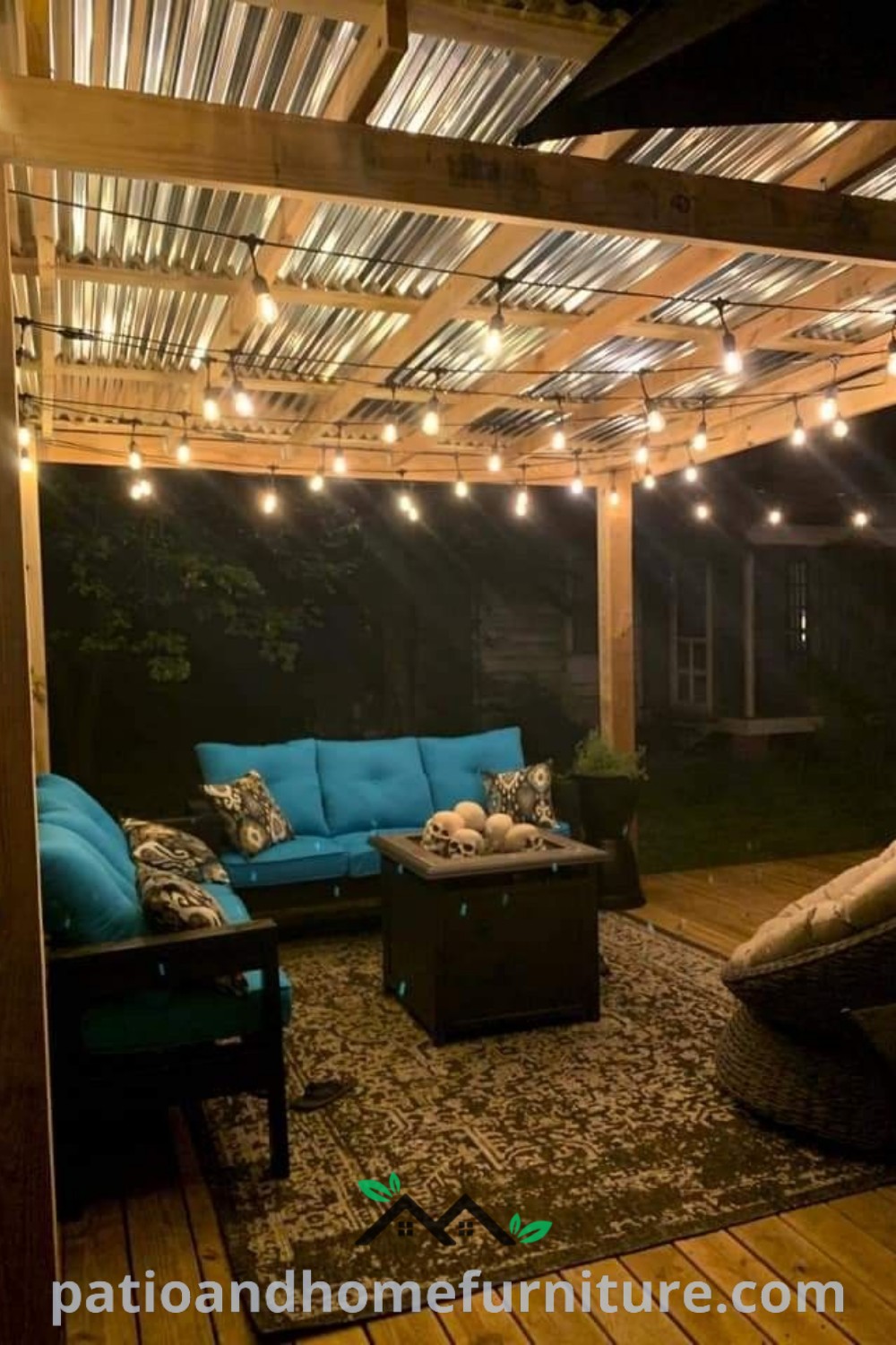 Outdoor living area featuring blue furniture and string lights on a patio, complemented by cozy decor ideas and covered options like pergolas, perfect for creating a welcoming and inspiring outdoor space for relaxation and gatherings. Visit wellnesswink.com for more unique ideas.
