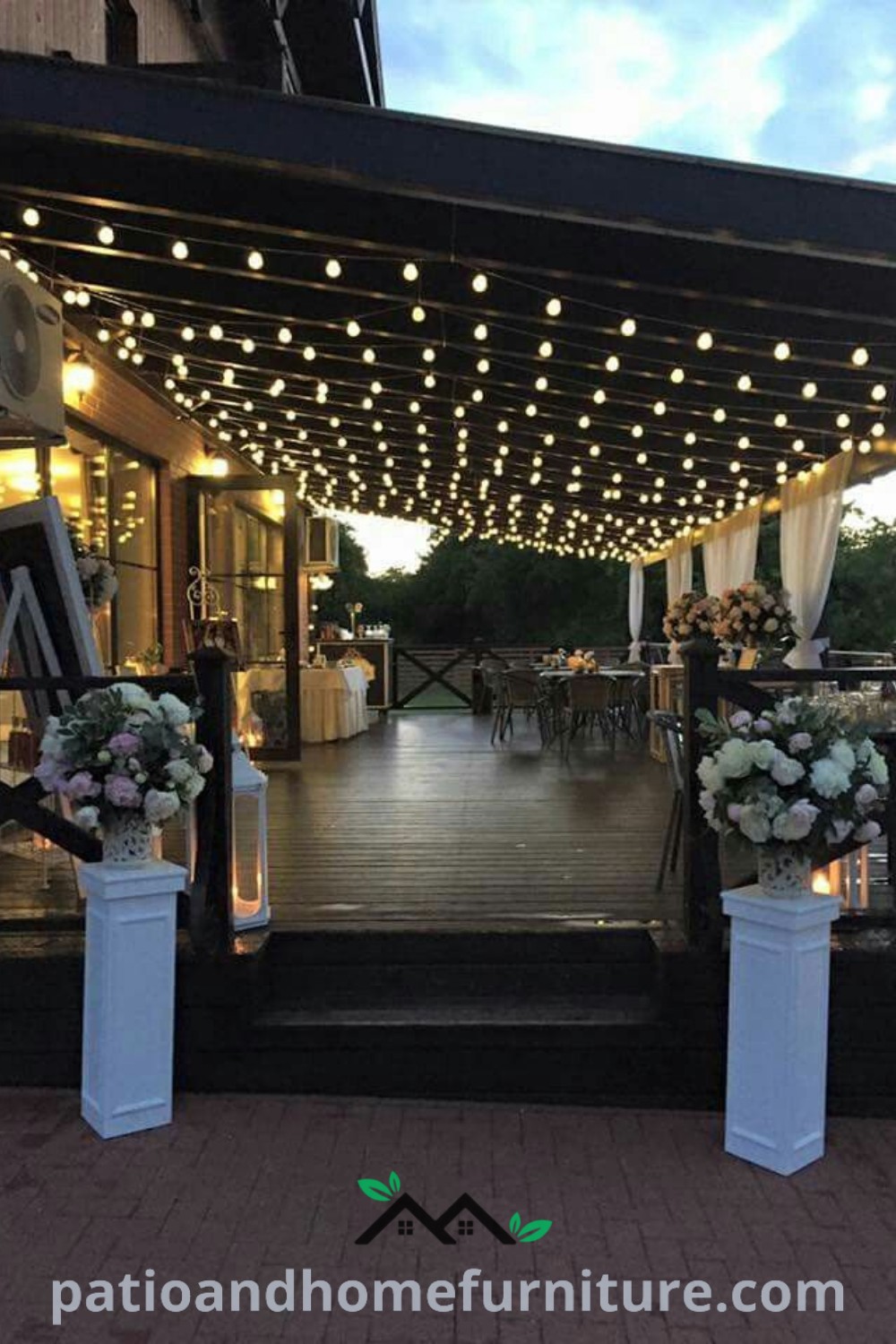Outdoor wedding venue adorned with white flowers and twinkling lights, surrounded by brick pavers, creating a romantic and inviting atmosphere, showcasing cozy design ideas, unique decor inspirations for celebrations, and contributing to a warm outdoor environment on wellnesswink.com.