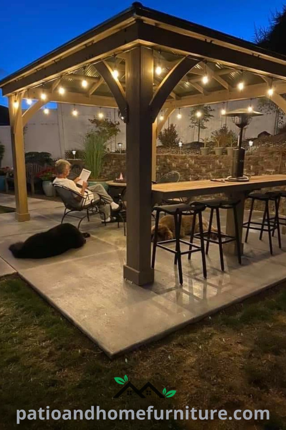 A cozy dog resting on the ground in front of a decorated covered patio with string lights, featuring bar seating and a relaxing atmosphere, inspiring cozy ideas for outdoor home design at wellnesswink.com.